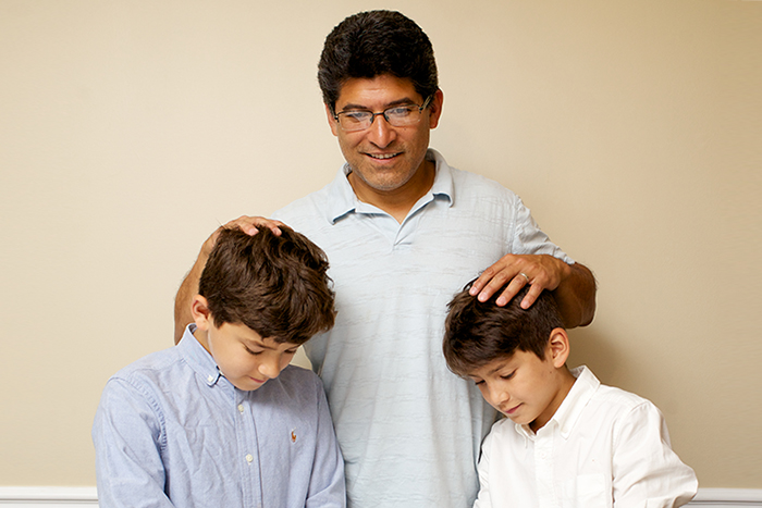 parent blessing two children