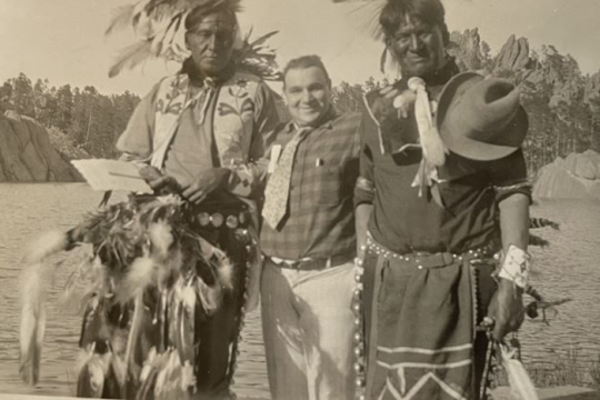 The author's Great-Great-Uncle Louie Sinykin posing with men in Dakota garb in South Dakota's Black Hills. Date unknown.