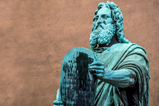 A statue of Moses holding a tablet